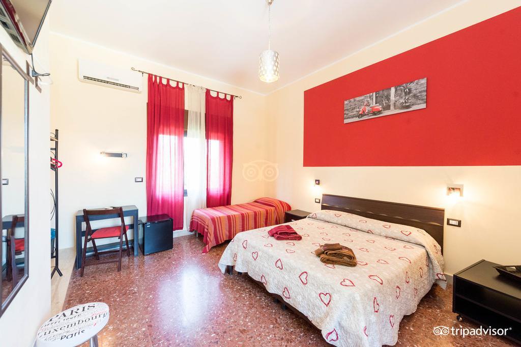 Camera Matrimoniale/Doppia con Letti Singoli con Letto Supplementare